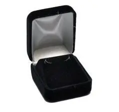 A black velvet box with silver lining and a silver lid.