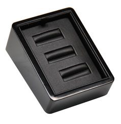 A black box with three different sized rings.