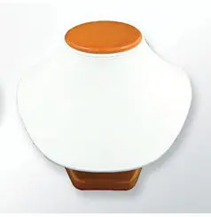 A white vase with an orange lid on top of a table.