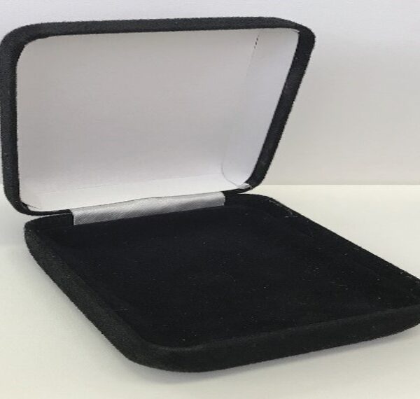 A black velvet box with a silver lid.