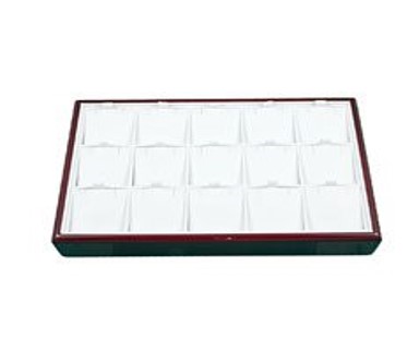 A tray with 1 8 compartments for watches and jewelry.