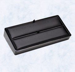 A black box with two compartments on top of it.