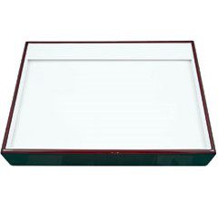 A white tray with red trim on top of it.