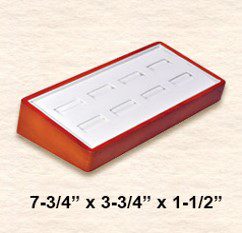 A red and white box with the numbers 7-3 / 4 x 3-1 / 2