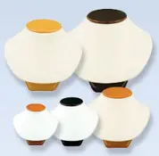 A group of five white and black jewelry displays.