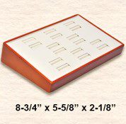 A brown and white tray with a row of numbers on it.