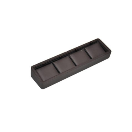 A black tray with four compartments on top of it.