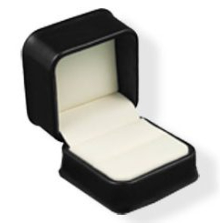 A black box with a white lid and a ring inside