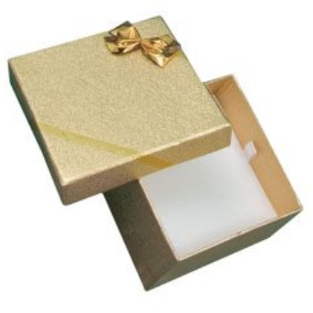 A gold box with a bow on top of it.