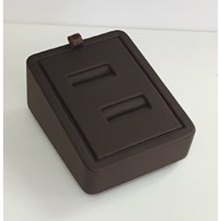 A brown box with two compartments on top of it.