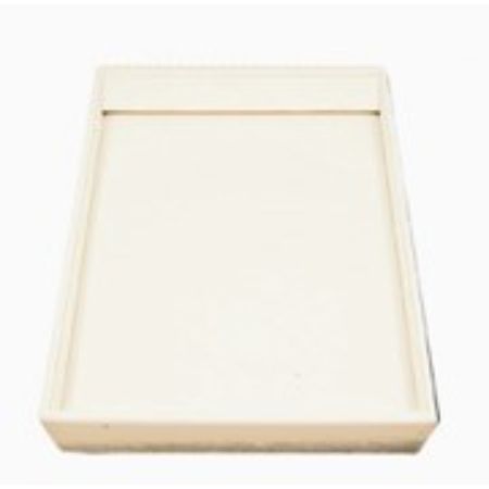 A white tray with a blank cover on top.