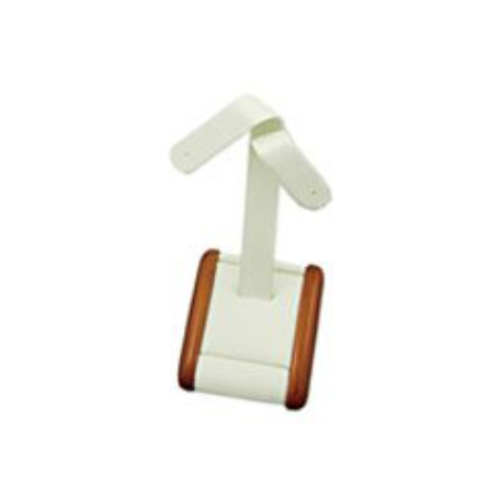 A white and brown phone holder is sitting on top of a table.