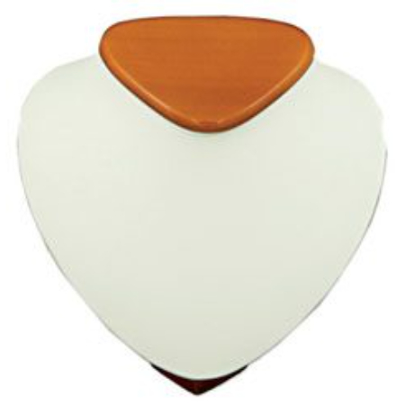 A white and brown heart shaped object sitting on top of a table.