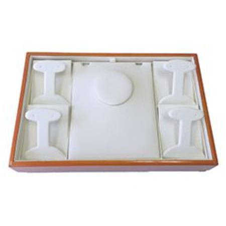 A white tray with four cups in it.