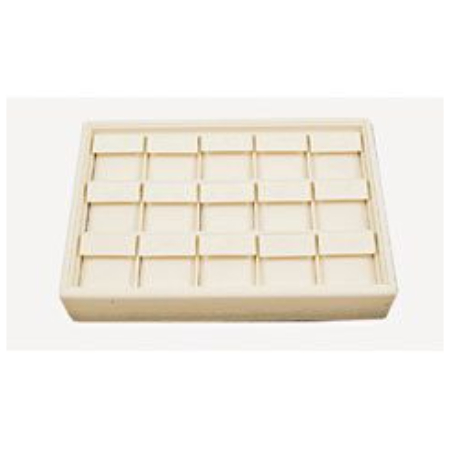 A white tray with many small squares of different sizes.