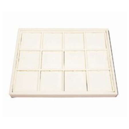 A white tray with 1 2 squares of paper.