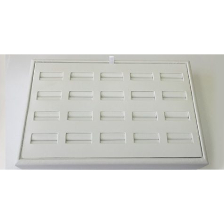 A white tray with many small holes in it.