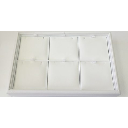 A white tray with eight small compartments.