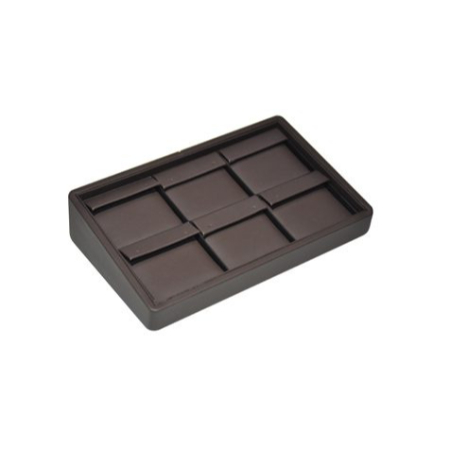 A brown tray with eight compartments.