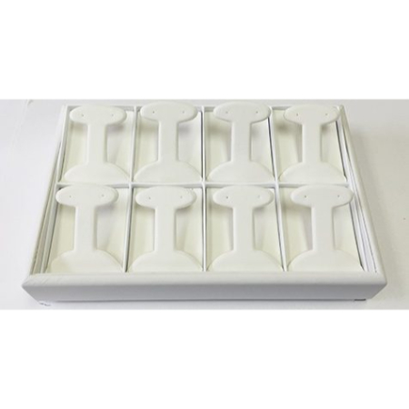 A white tray with eight small white trays.