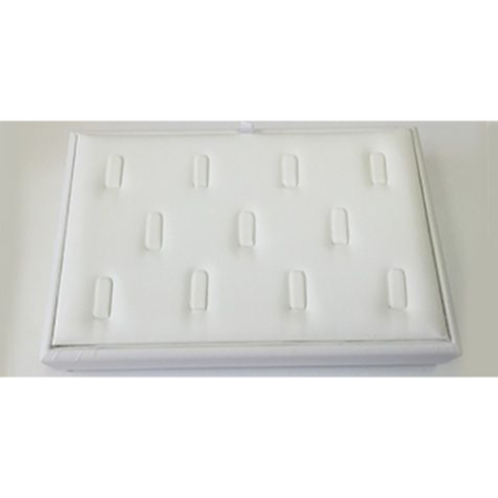 A white tray with ten rings on top of it.