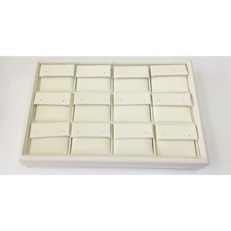 A white tray with many small boxes in it