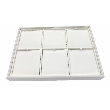 A white tray with six square trays in it.