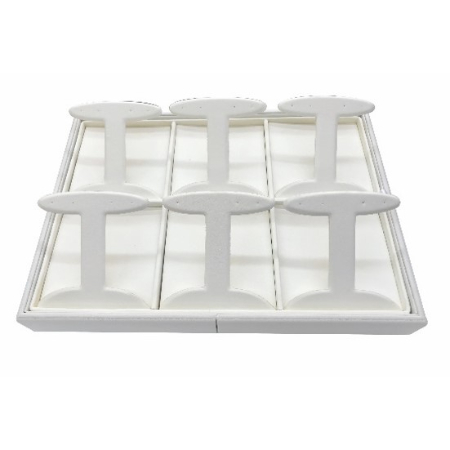 A white tray with nine pieces of plastic