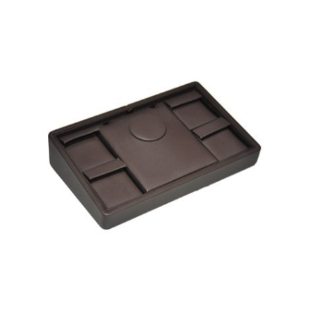 A brown box with four compartments on top of it.