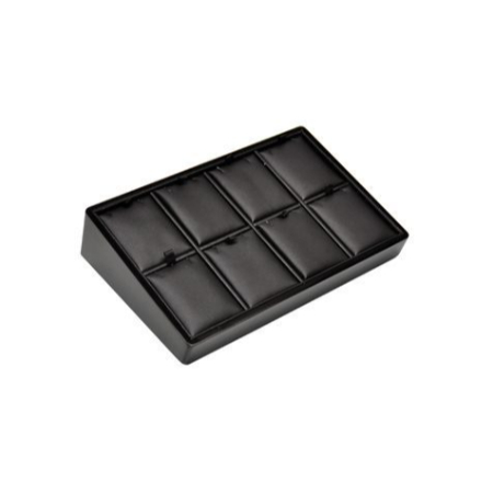 A black tray with eight compartments.