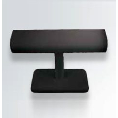 A black metal object sitting on top of a table.