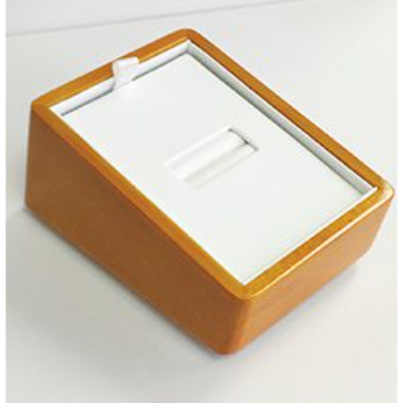 A wooden box with a white lid and a white base.