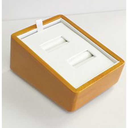 A wooden box with two white plastic inserts.