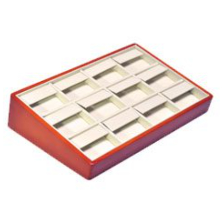 A red and white tray with many compartments