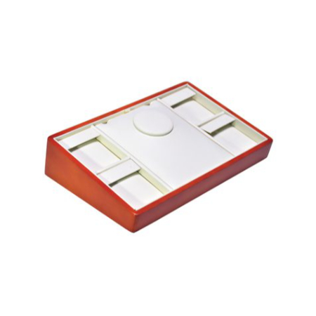 A red box with white lid and a small white tray.