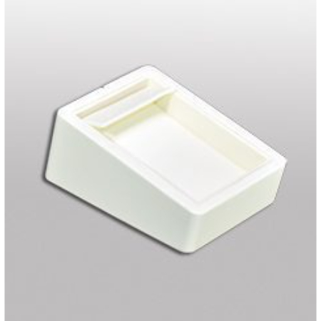 A white plastic container sitting on top of a floor.