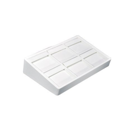 A white box with many small boxes on top of it.