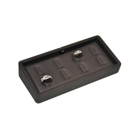 A black tray with two silver rings on top of it.