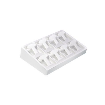 A white tray with eight pieces of plastic