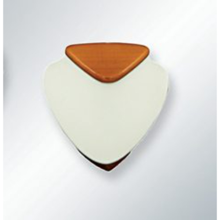 A white and brown heart shaped object on top of a wall.