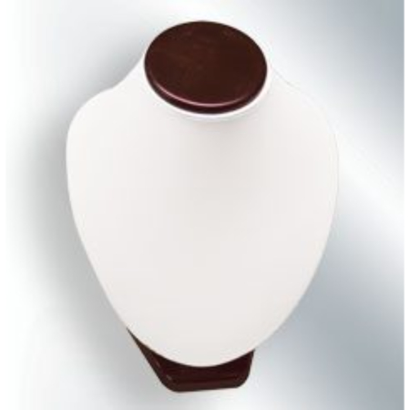 A white and brown ceramic vase on top of a wall.