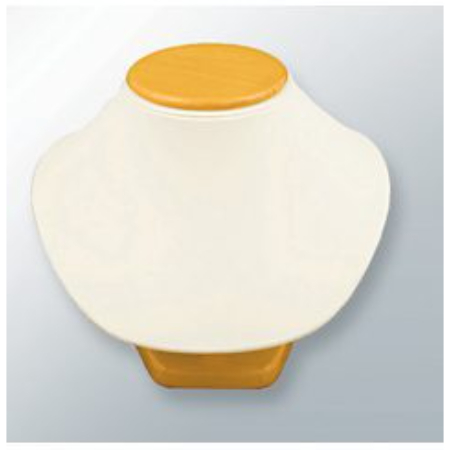 A white and yellow necklace holder on top of a table.