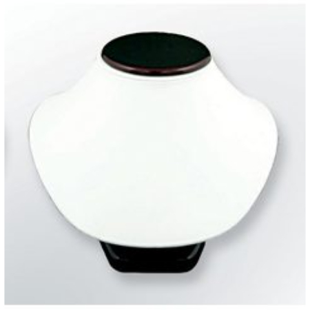 A white and black necklace holder on top of a wall.