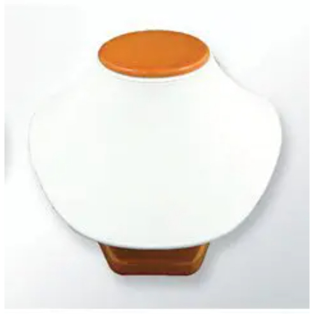 A white and orange object is sitting on the floor.