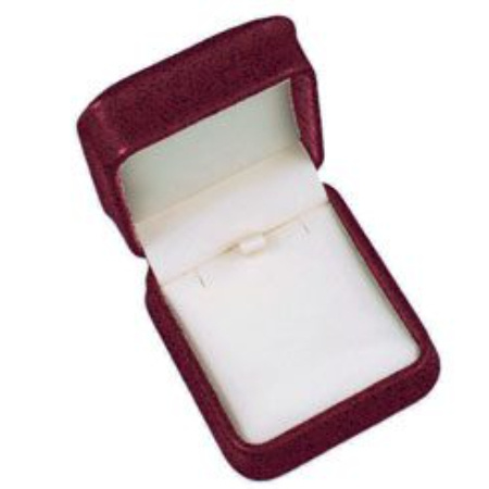 A red velvet jewelry box with a white interior.