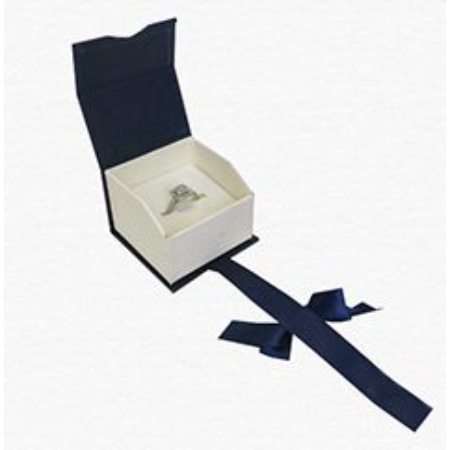 A white box with a blue ribbon around it