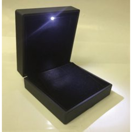 A black box with a light inside of it