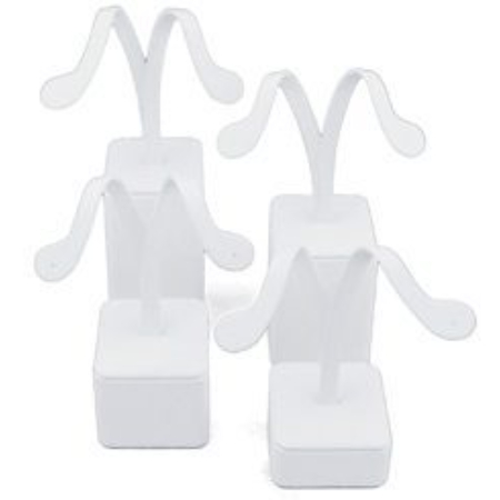 A pair of white plastic jewelry stands.