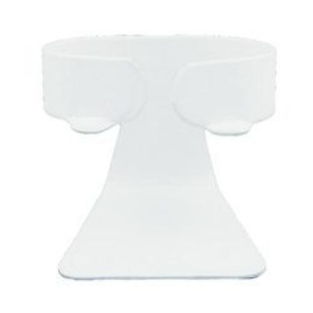 A white plastic cup holder sitting on top of a table.