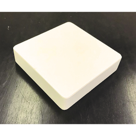 A white box sitting on top of a table.